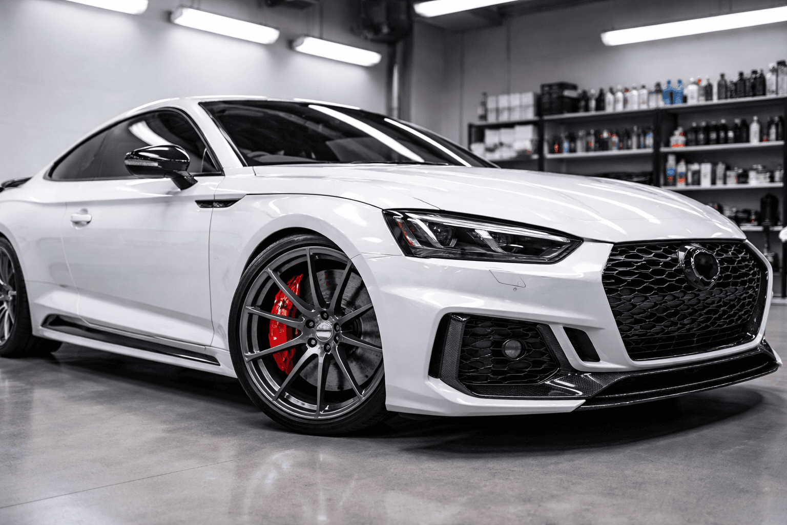 Wheel and caliper detailing on premium performance car